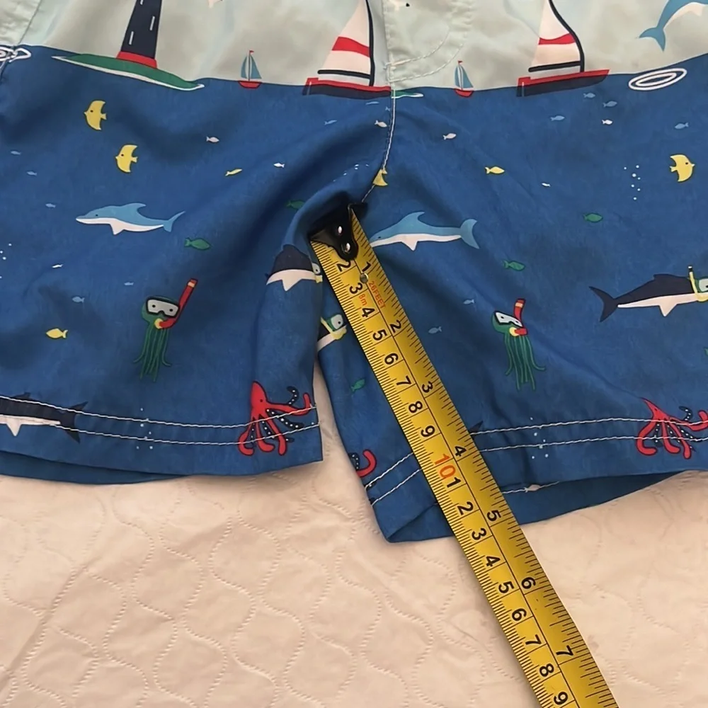 Carter’s sailboat print lined blue multicolor swim trunks